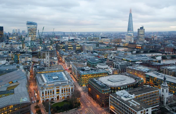 LONDON, UK - JANUARY 27, 2015: City of London, business and banking area. London's panorama at sun set.