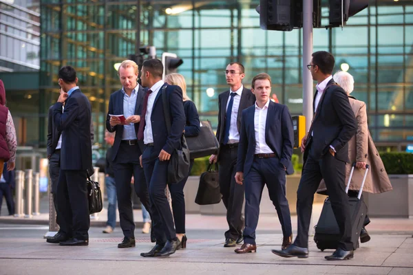 LONDON, UK - 7 SEPTEMBER, 2015: Canary Wharf business life. Business people going home after working day.