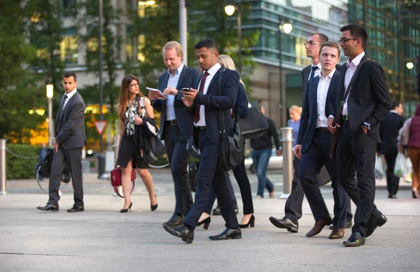 LONDON, UK - 7 SEPTEMBER, 2015: Canary Wharf business life. Business people going home after working day.