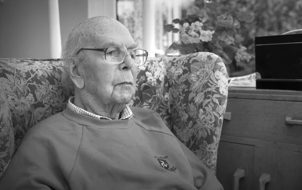 95 years old English man portrait in domestic interior