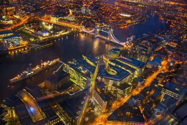 City of London. Tower  bridge night view business and financial aria view at sunset. Night view of railways leading to London Bridge station and well lit up streets