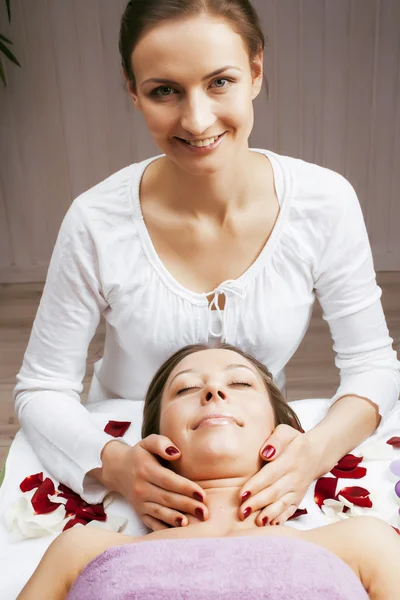 Stock photo attractive lady getting spa treatment in salon, massage doctor smiling care pretty