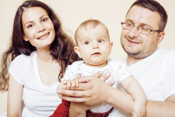 Young happy modern family smiling together at home. lifestyle people concept, father holding baby son