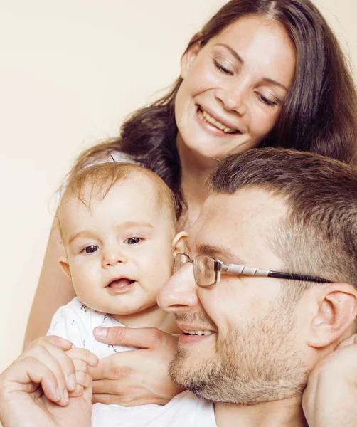 Young happy modern family smiling together at home. lifestyle people concept, father holding baby son