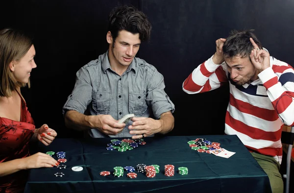 Young people playing poker off-line tournament, friends party concept