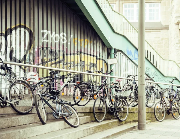 Many bicycles on street of Amsterdam city, parking ideal traffic eco healthy lifestyle concept close up at sunlight, health care stuff