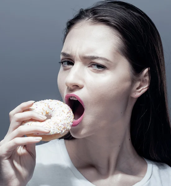 Thin girl with donut