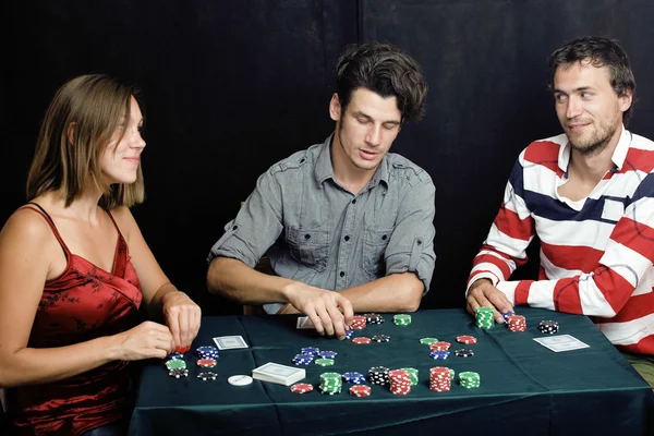 Young people playing poker off-line tournament betting call