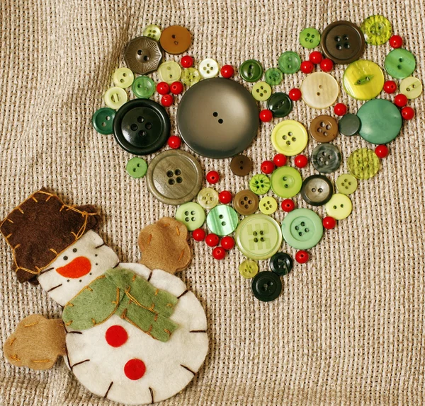 Christmas card wooden vintage with handmade gifts, toys, cookie, snowman, santaclaus, button heart warm winter