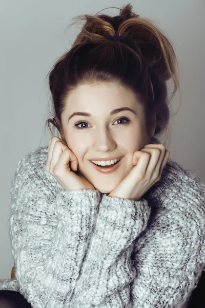 Beauty young real woman in sweater at winter warmed up, cheerful smiling closeup