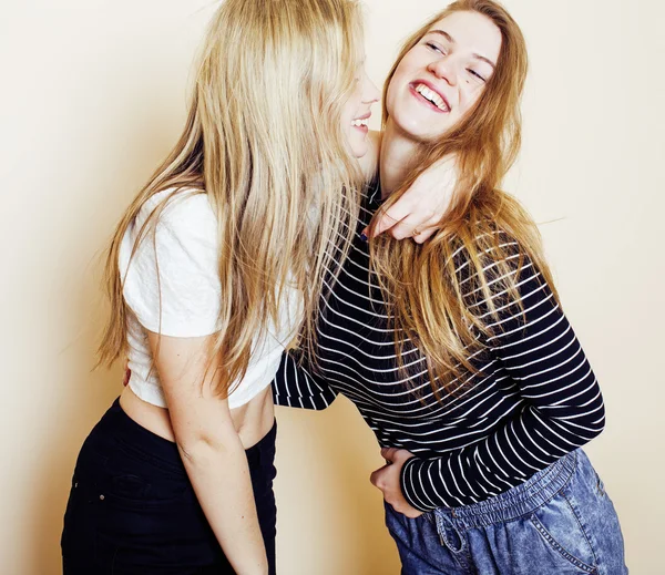 Lifestyle and people concept: Fashion portrait of three stylish sexy girls best friends, over white background. Happy time for fun.