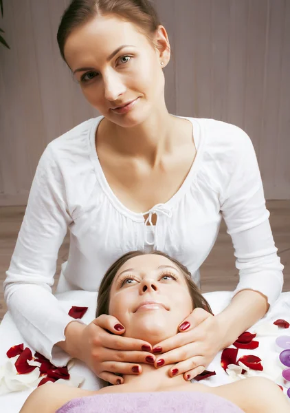 Stock photo attractive lady getting spa treatment in salon, massage doctor smiling care pretty