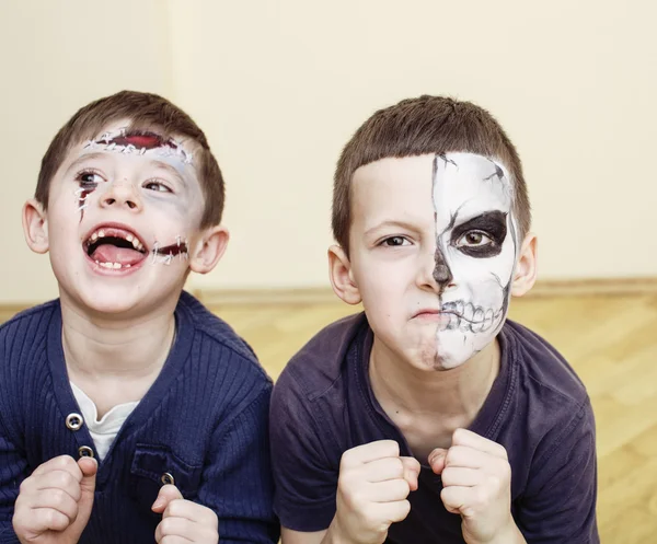 Zombie apocalypse kids concept. Birthday party celebration facepaint on children dead bride, scar face, zombi skeleton together