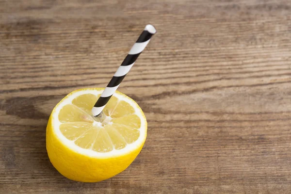 Lemon juice with straw