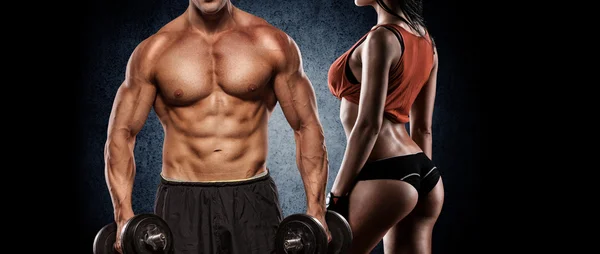 Athletic man and woman with a dumbbells