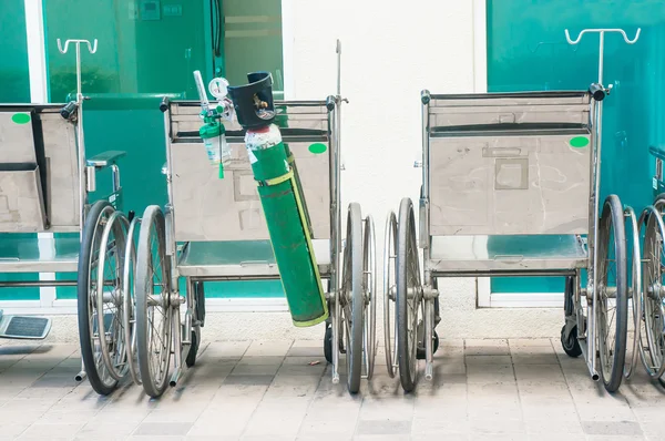 Wheelchair and oxygen tank in the hospital