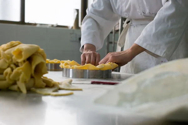 Pastry Chef Kneeding Pie Dough