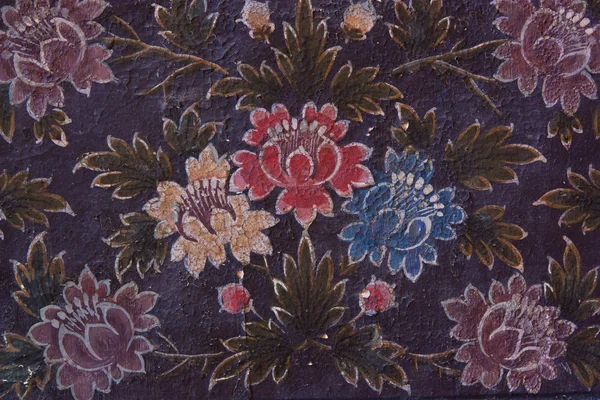 Antique floral painting on the walls.