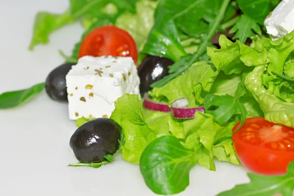 Salad with tomatoes and olives with feta cheese