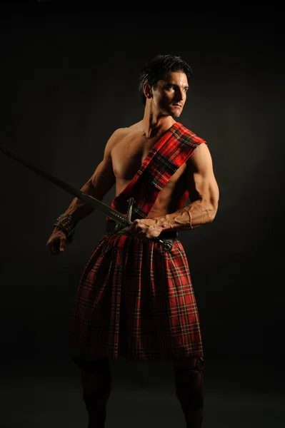 look over the shoulder pose holding knives look over the shoulder pose holding knives