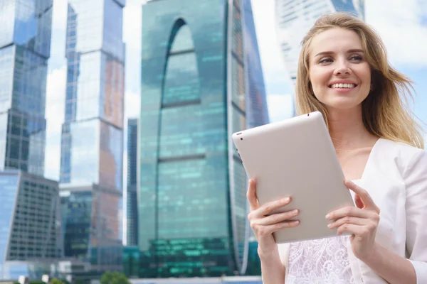 Young beautiful woman with tablet pc