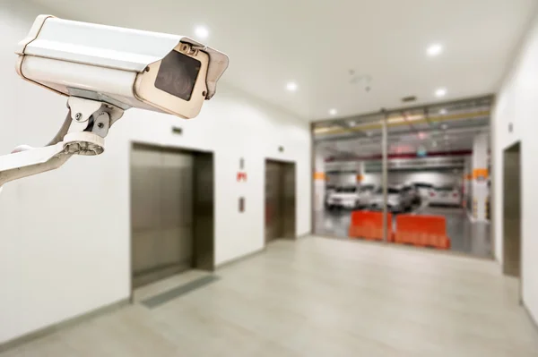 CCTV operating in car park building with elevator