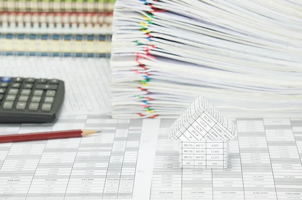 House have blur stack paperwork and notebook as background