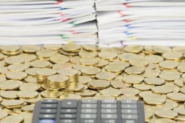 Pile of gold coins on stack of gold coins