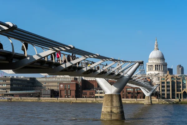 LONDON - MAR 13 : Millennium Bridge and St Pauls Cathedral in Lo