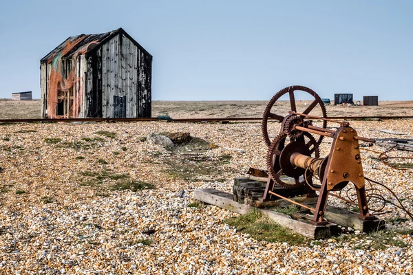 Old shack and rusty machinery on Dungeness beach