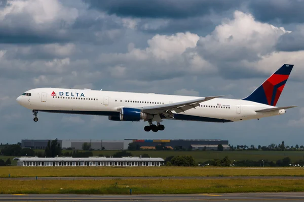 PRAGUE - JUNE 16: Delta Airlines Boeing B767-400 landing at PRG Airport on June 16, 2016 in Prague, France. Delta is one of the biggest airlines in the world serve over 300 destinations around the world