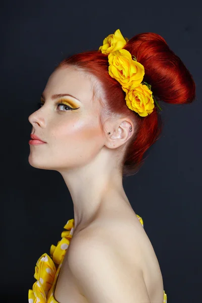 Charming red-haired woman with perfect makeup retro hairstyles i