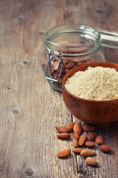 Almond flour in a wooden bowl (Toning)