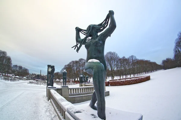 Sculpture of a woman with long hair in the Vigeland sculpture park in Oslo, Norway
