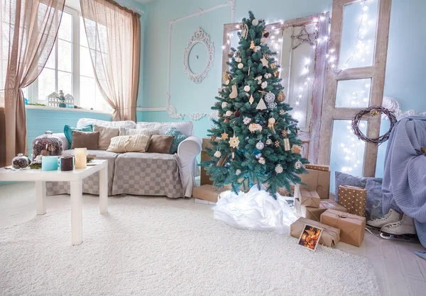 Beautiful New Year Holiday decorated room with presents under th