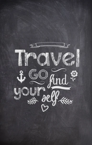 Travel Quote written with chalk on a black board