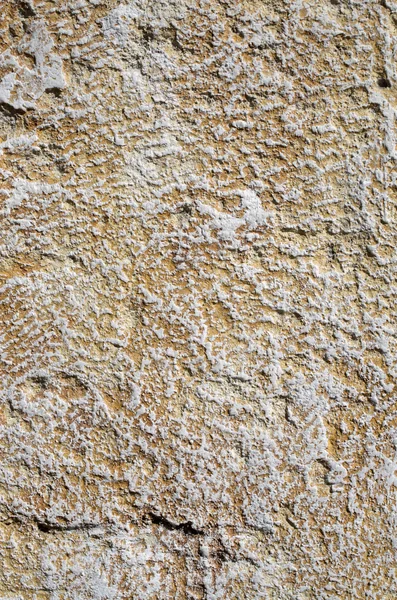 Decorative relief plaster imitating stones on wall