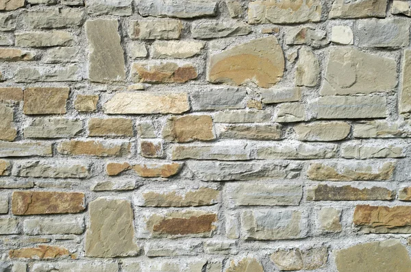 New stone cladding plates on the wall