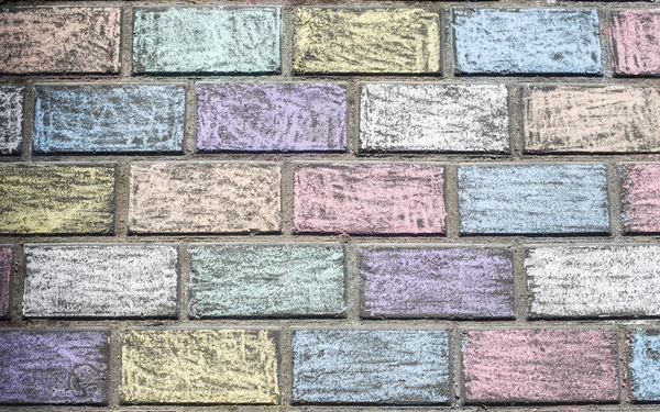 Concrete tiles colored chalk from children