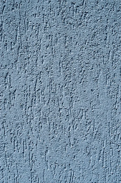 Light blue decorative relief plaster on wall