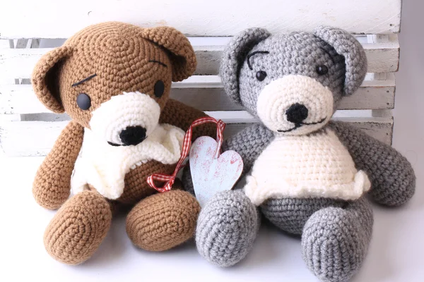 Pair of handmade knitted bears love Valentine\'s Day