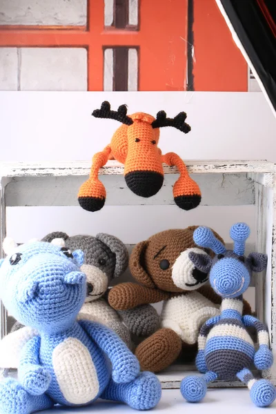 Box handmade knitted toys