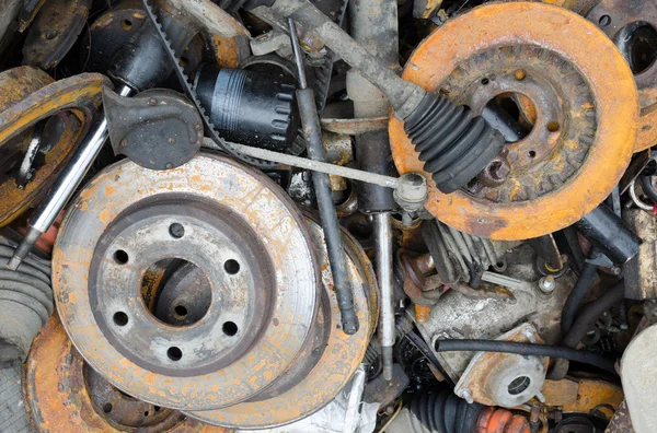 Worn out rusty brake discs and other parts