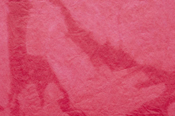 Red painted crepe paper background