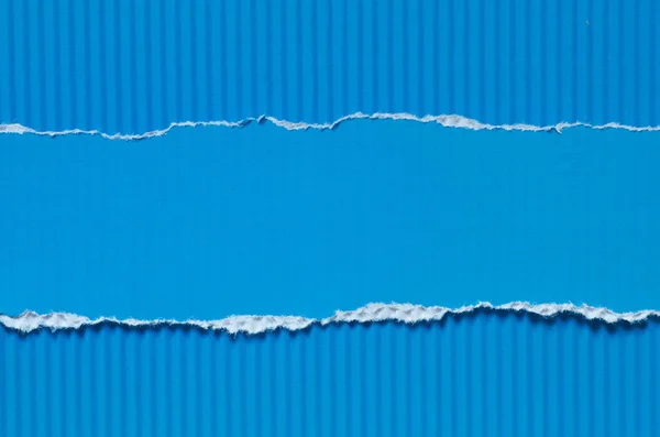 Blue torn paper background texture