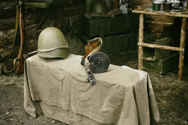 Military helmet and submachine gun Shpagina, reconstruction of life and subjects of second world war