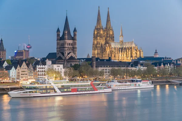 Aerial view over the Rhine River with cruise ship in Cologne, Ge