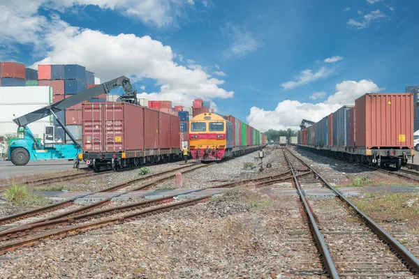 Cargo train platform with freight train container at depot