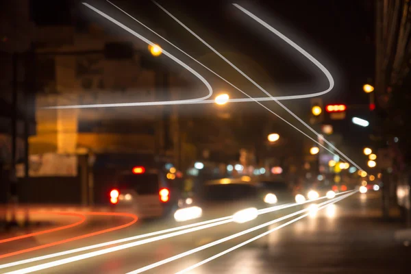 Night traffic lights at intersection.