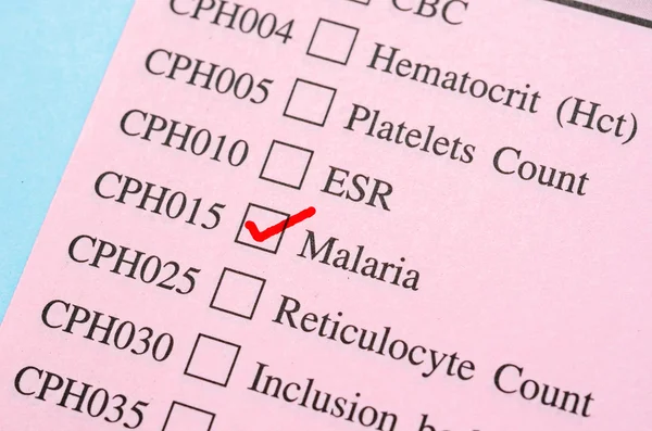 Malaria test form paper in laboratory.